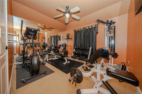 a view of a room with gym equipment