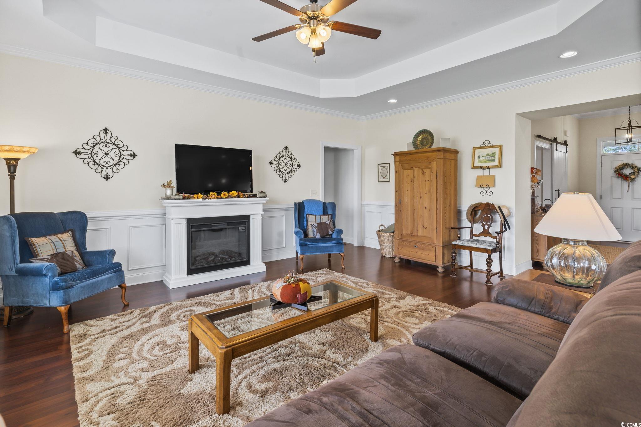120 Stonehinge Court Conway, SC 29526 - Photo 14 of 31 Living room featuring crown molding, ceiling fan,