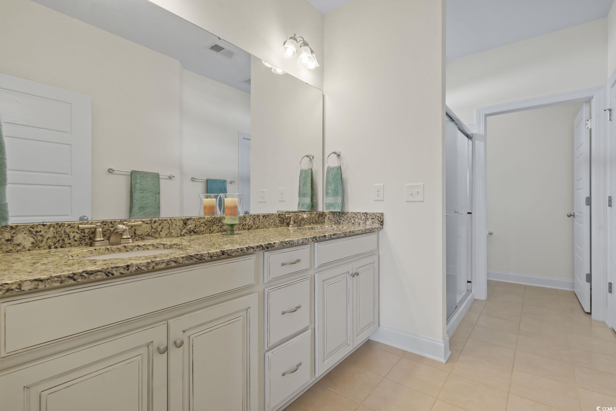 120 Stonehinge Court Conway, SC 29526 - Photo 17 of 31 Bathroom featuring tile patterned flooring, an enc