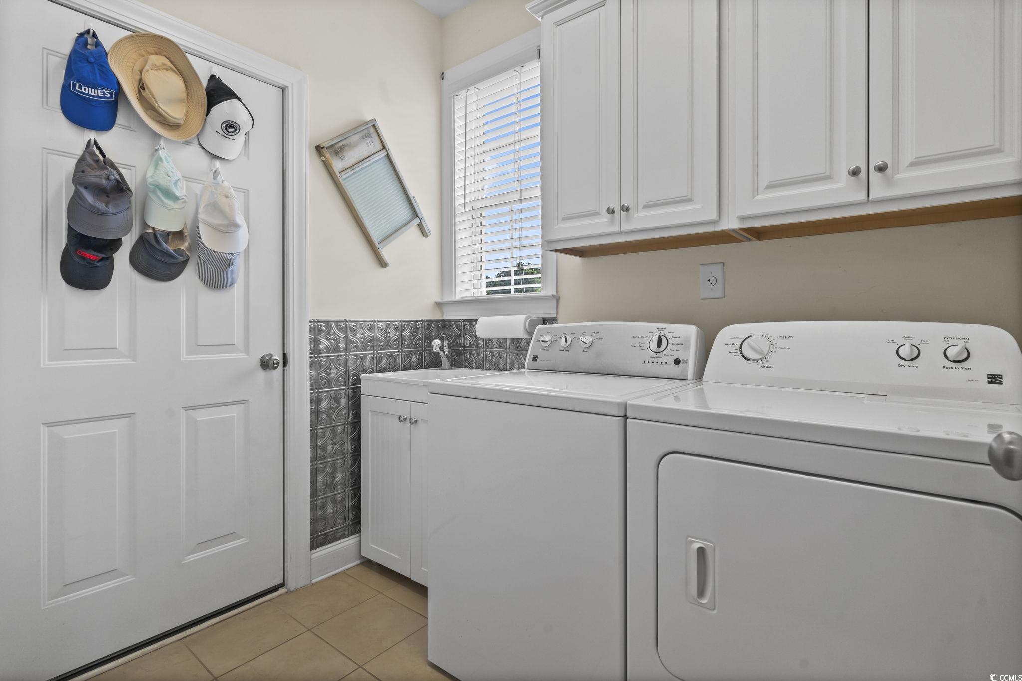 120 Stonehinge Court Conway, SC 29526 - Photo 22 of 31 Laundry area featuring cabinets, washer and clothe