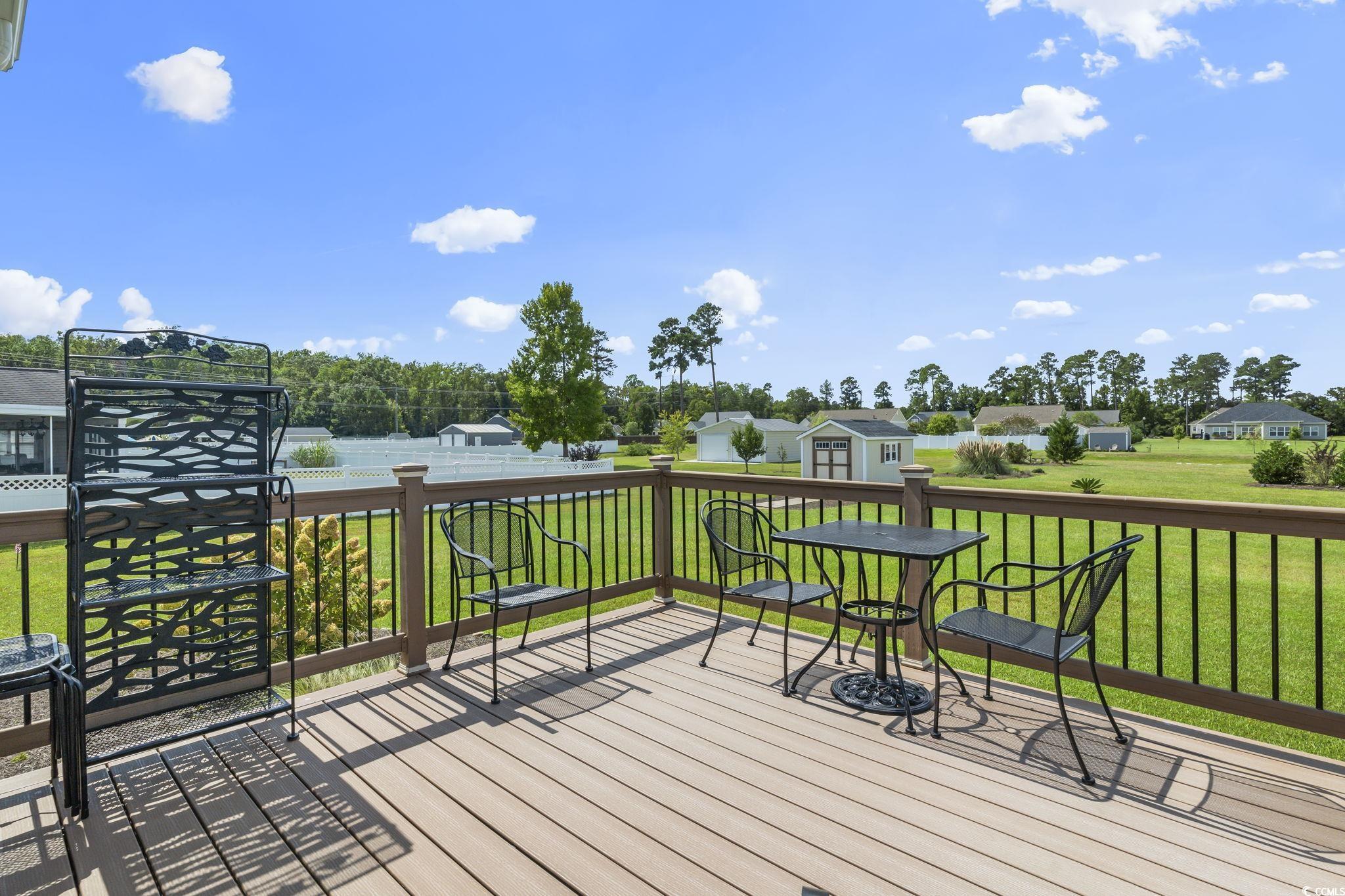 120 Stonehinge Court Conway, SC 29526 - Photo 23 of 31 Deck with a yard and a storage unit