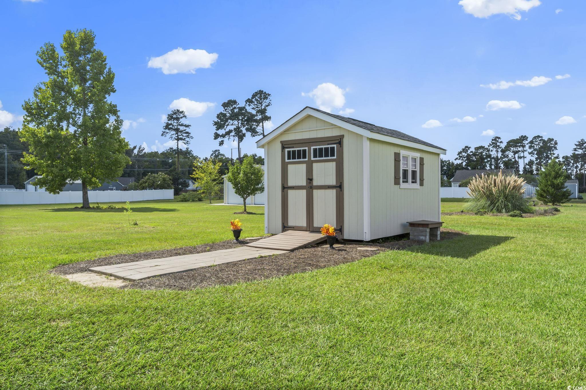 120 Stonehinge Court Conway, SC 29526 - Photo 26 of 31 View of outbuilding with a lawn