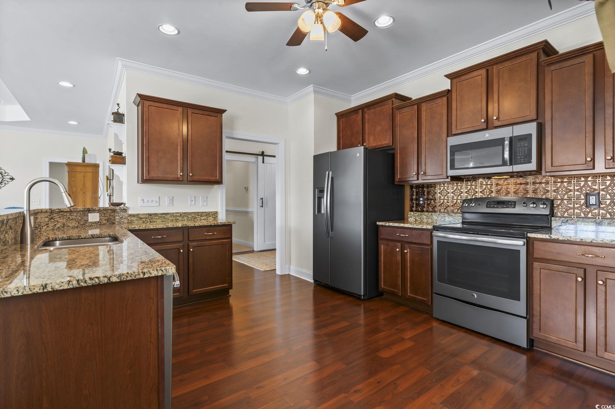 120 Stonehinge Court Conway, SC 29526 - Photo 10 of 31 Kitchen with stainless steel appliances, dark hard