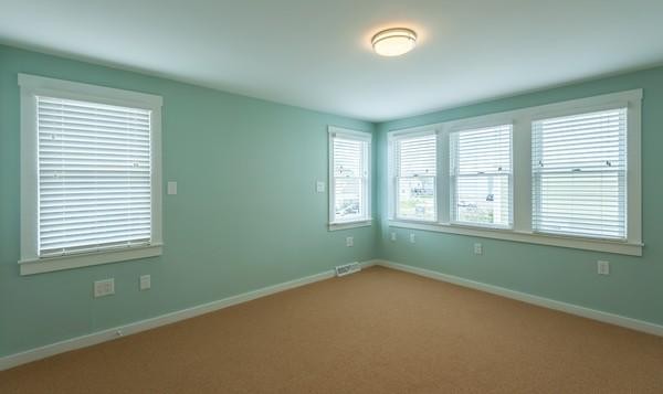 149 Jericho Road, Unit A Scituate, MA 02066 - Photo 13 of 21 an empty room with a window and closet