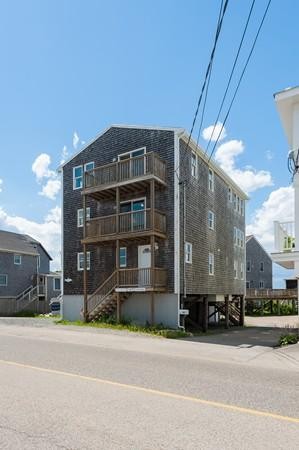 149 Jericho Road, Unit A Scituate, MA 02066 - Photo 4 of 21 a front view of a building with a street