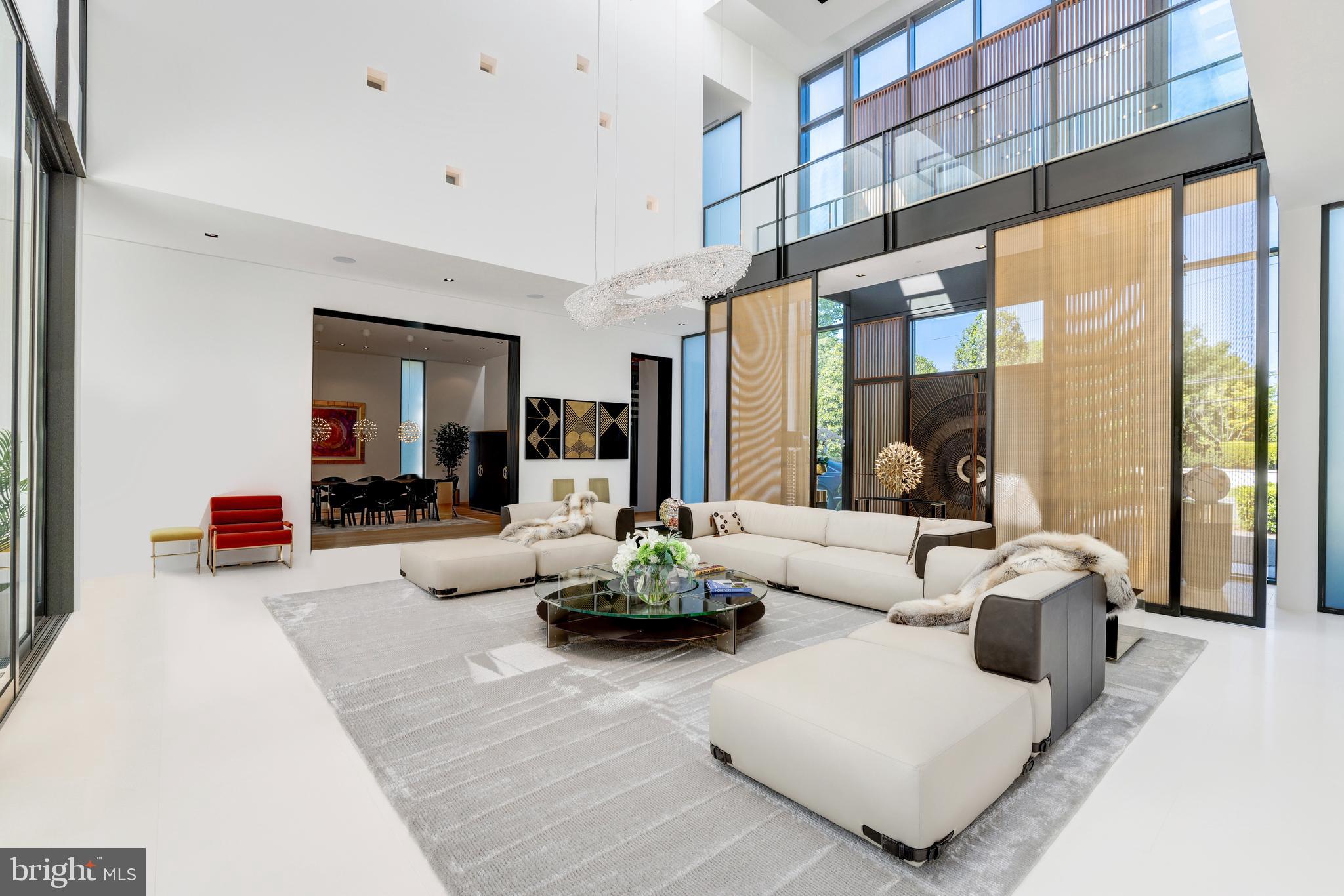 410 Chain Bridge Road McLean, VA 22101 - Photo 11 of 26 a living room with furniture and a large window