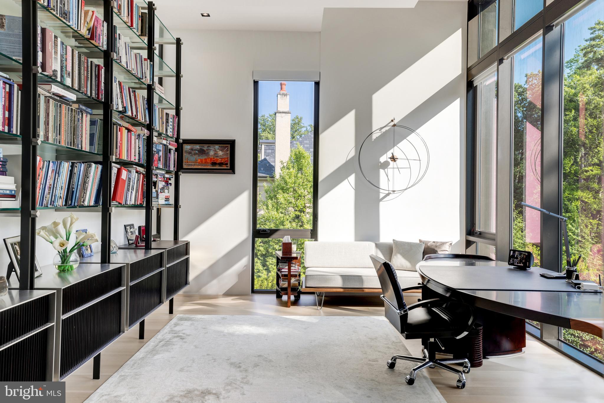 410 Chain Bridge Road McLean, VA 22101 - Photo 18 of 26 a view of a workspace with furniture and a window