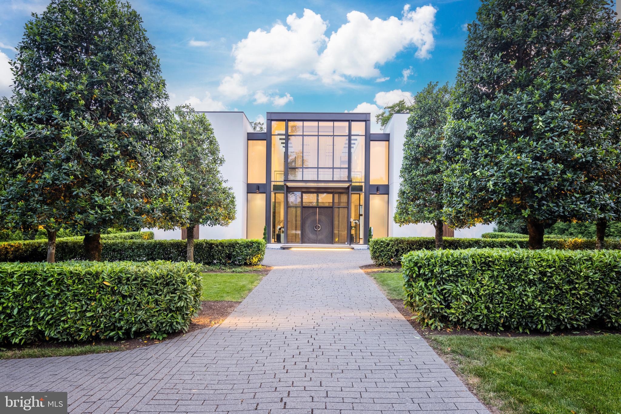 410 Chain Bridge Road McLean, VA 22101 - Photo 2 of 26 a view of a garden with pathway