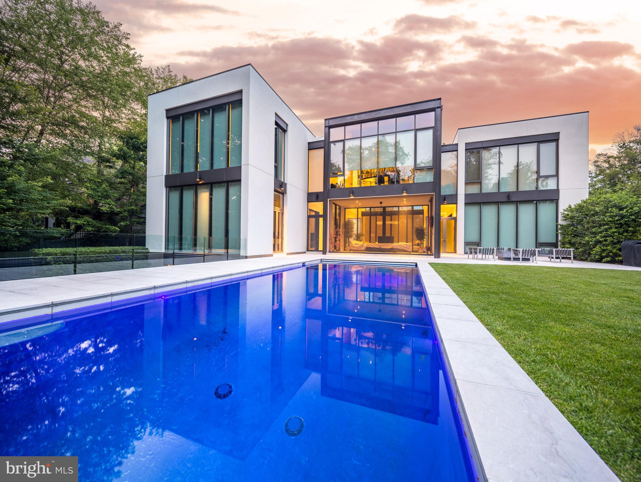 410 Chain Bridge Road McLean, VA 22101 - Photo 24 of 26 a view of swimming pool with a yard and plants