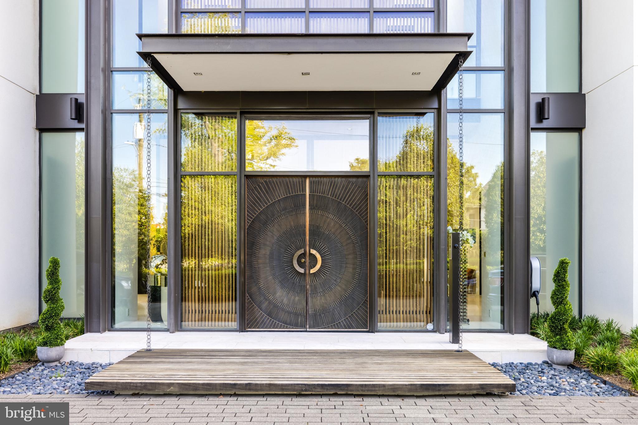 410 Chain Bridge Road McLean, VA 22101 - Photo 3 of 26 Bronze Sunburst Double Doors