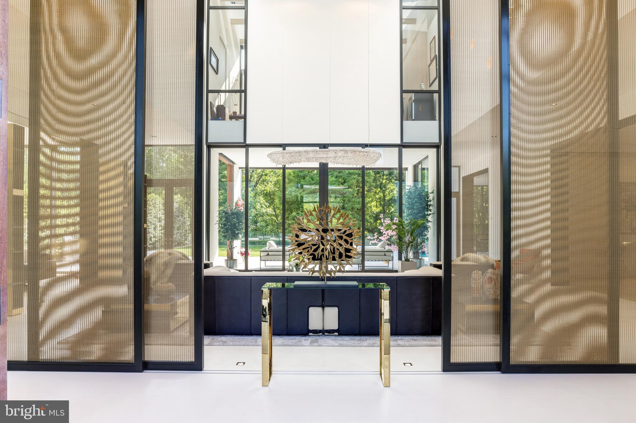 410 Chain Bridge Road McLean, VA 22101 - Photo 4 of 26 Sliding walls of bronze mesh screens