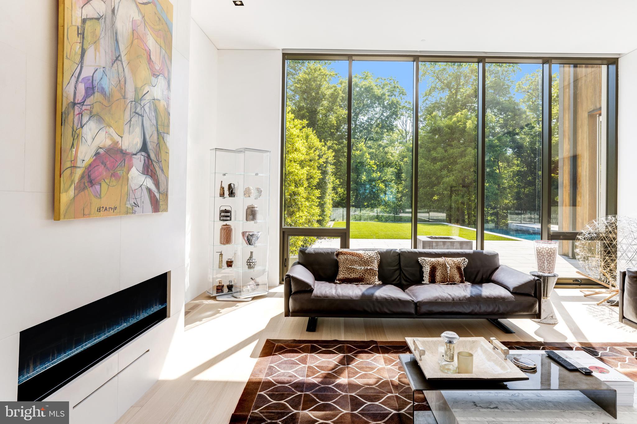 410 Chain Bridge Road McLean, VA 22101 - Photo 7 of 26 a living room with furniture and a large window