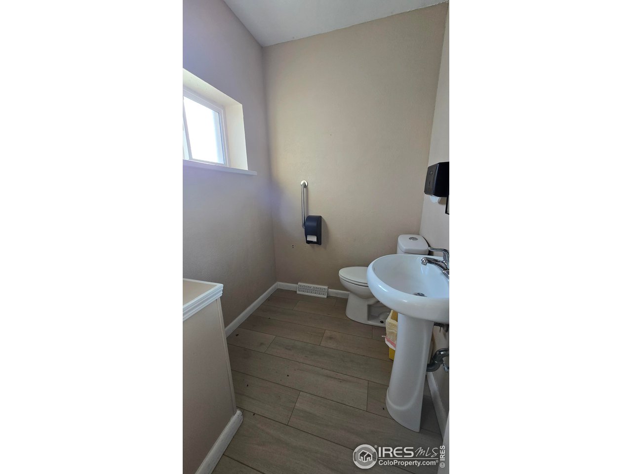 118 Dickson Street Wiggins, CO 80654 - Photo 20 of 34 LARGE HALF BATH #1