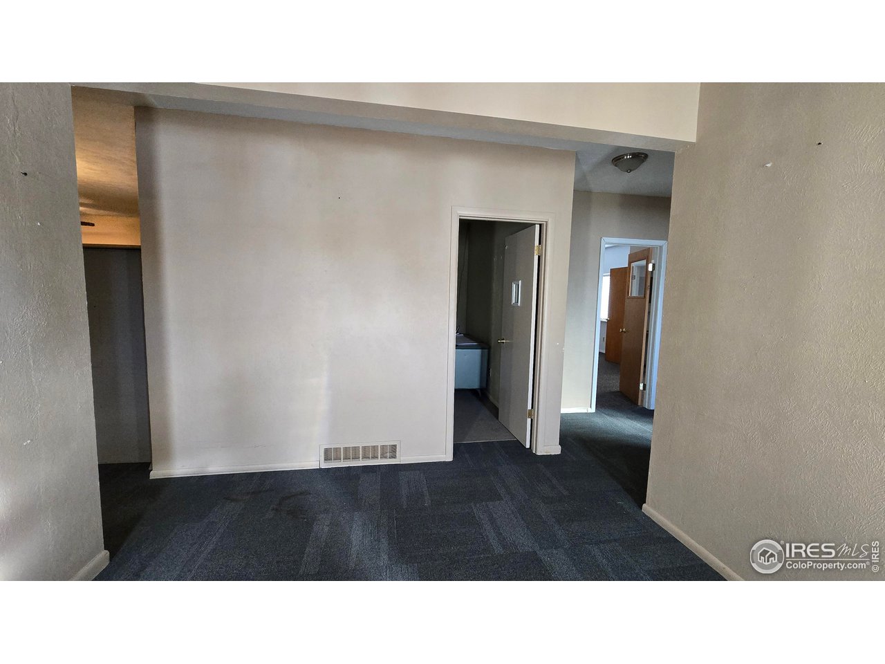 118 Dickson Street Wiggins, CO 80654 - Photo 24 of 34 FROM MAIN ENTRANCE LOOKING TO BOTH OFFICE AREAS