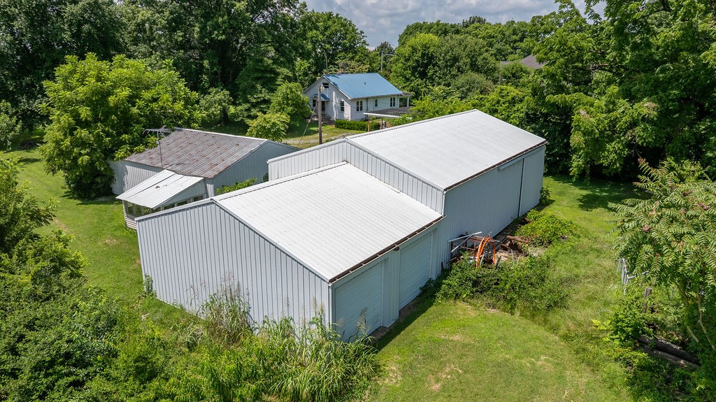 2450 Pembroke Road Hopkinsville, KY 42240 - Photo 7 of 12 an aerial view of a house with yard and outdoor seating