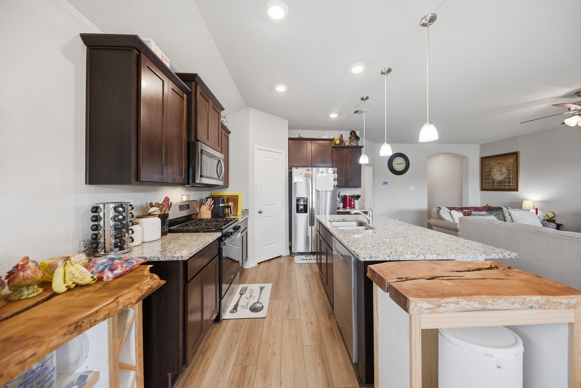 803 Davy Street Brenham, TX 77833 - Photo 2 of 26 ...and a bright and open living/kitchen/dining area.