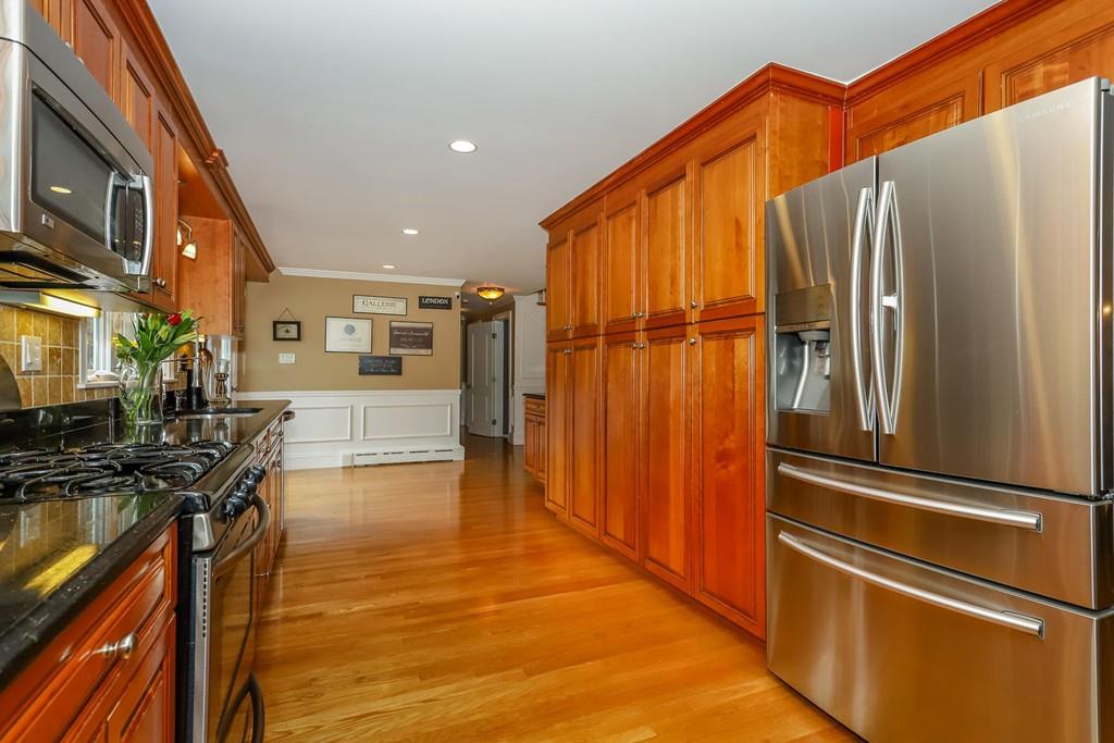 17 Fairview Road Canton, MA 02021 - Photo 12 of 40 a view of a living room with a flat screen tv