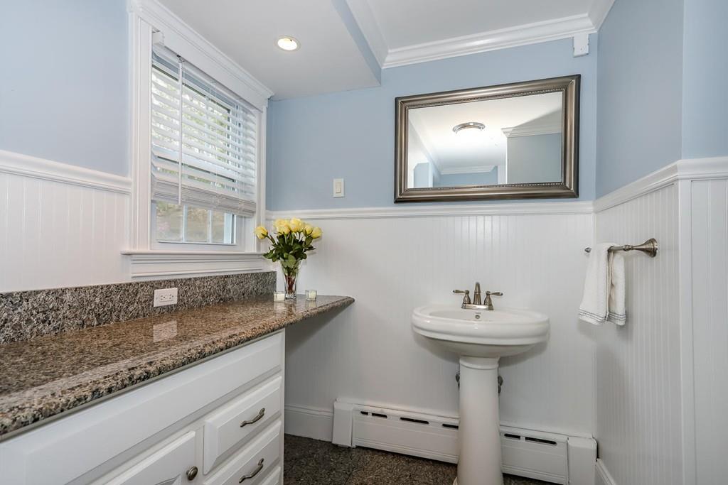 17 Fairview Road Canton, MA 02021 - Photo 16 of 40 a bathroom with a sink and a mirror