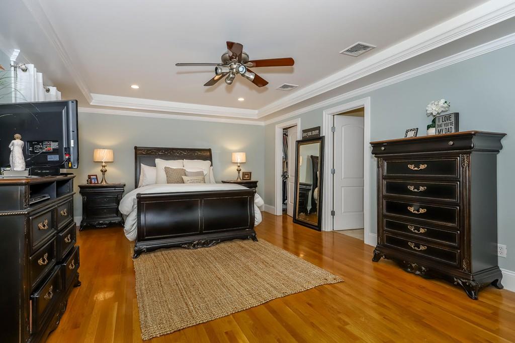 17 Fairview Road Canton, MA 02021 - Photo 20 of 40 a bedroom with furniture and flat screen tv