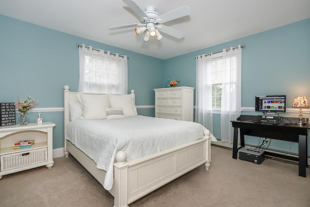 17 Fairview Road Canton, MA 02021 - Photo 22 of 40 a bedroom with a bed and a chandelier