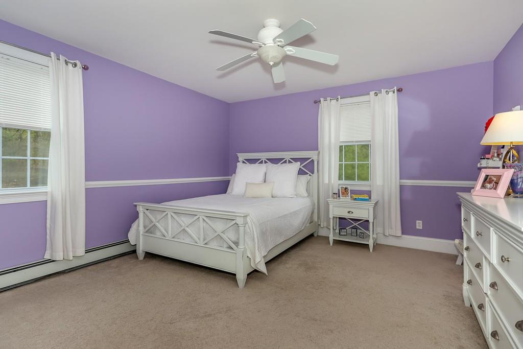 17 Fairview Road Canton, MA 02021 - Photo 23 of 40 a bedroom with a bed and a ceiling fan