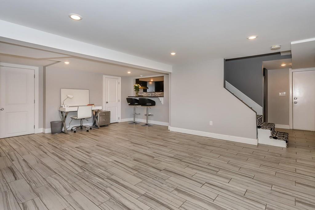 17 Fairview Road Canton, MA 02021 - Photo 28 of 40 a room with furniture and wooden floor