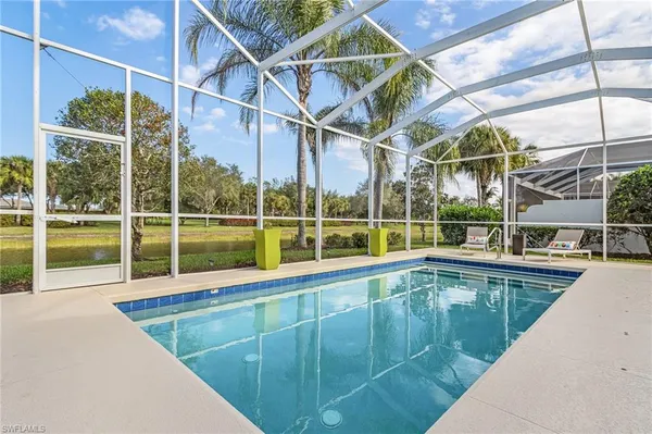 a view of a house with a swimming pool
