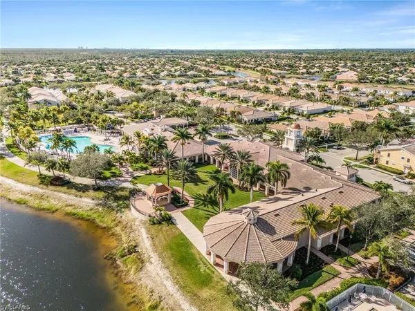 an aerial view of residential building with parking space