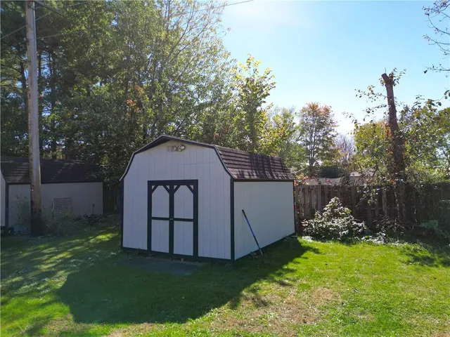 a view of a chair and table in the balcony