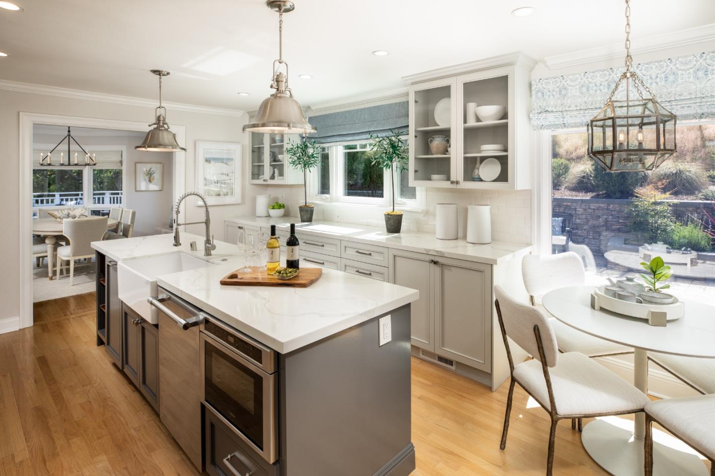 345 Harcross Road Woodside, CA 94062 - Photo 8 of 37 a kitchen with a stove a table and chairs