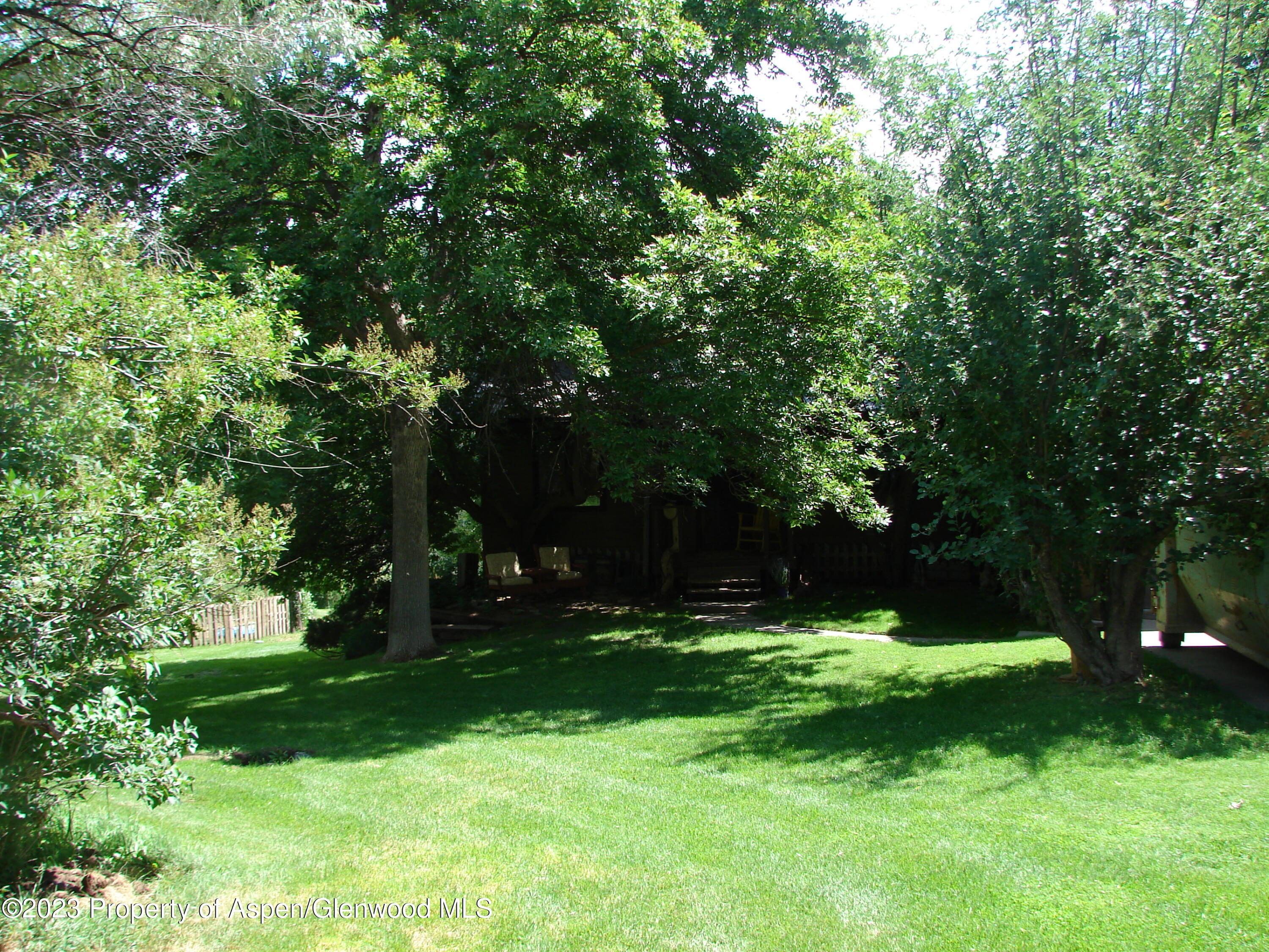 60 Chelyn Road Glenwood Springs, CO 81601 - Photo 12 of 53 a view of green field with trees in the background