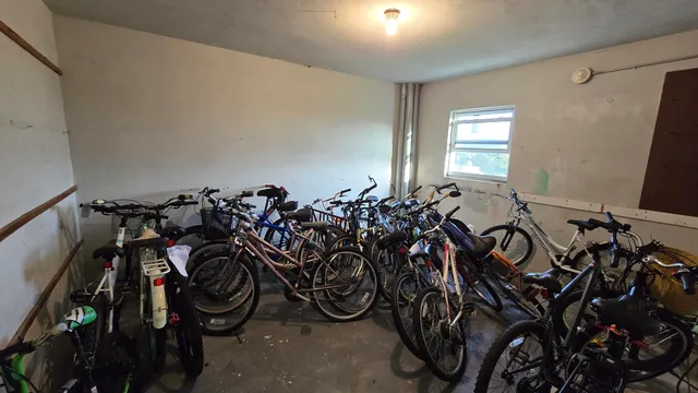a group of bicycles are parked