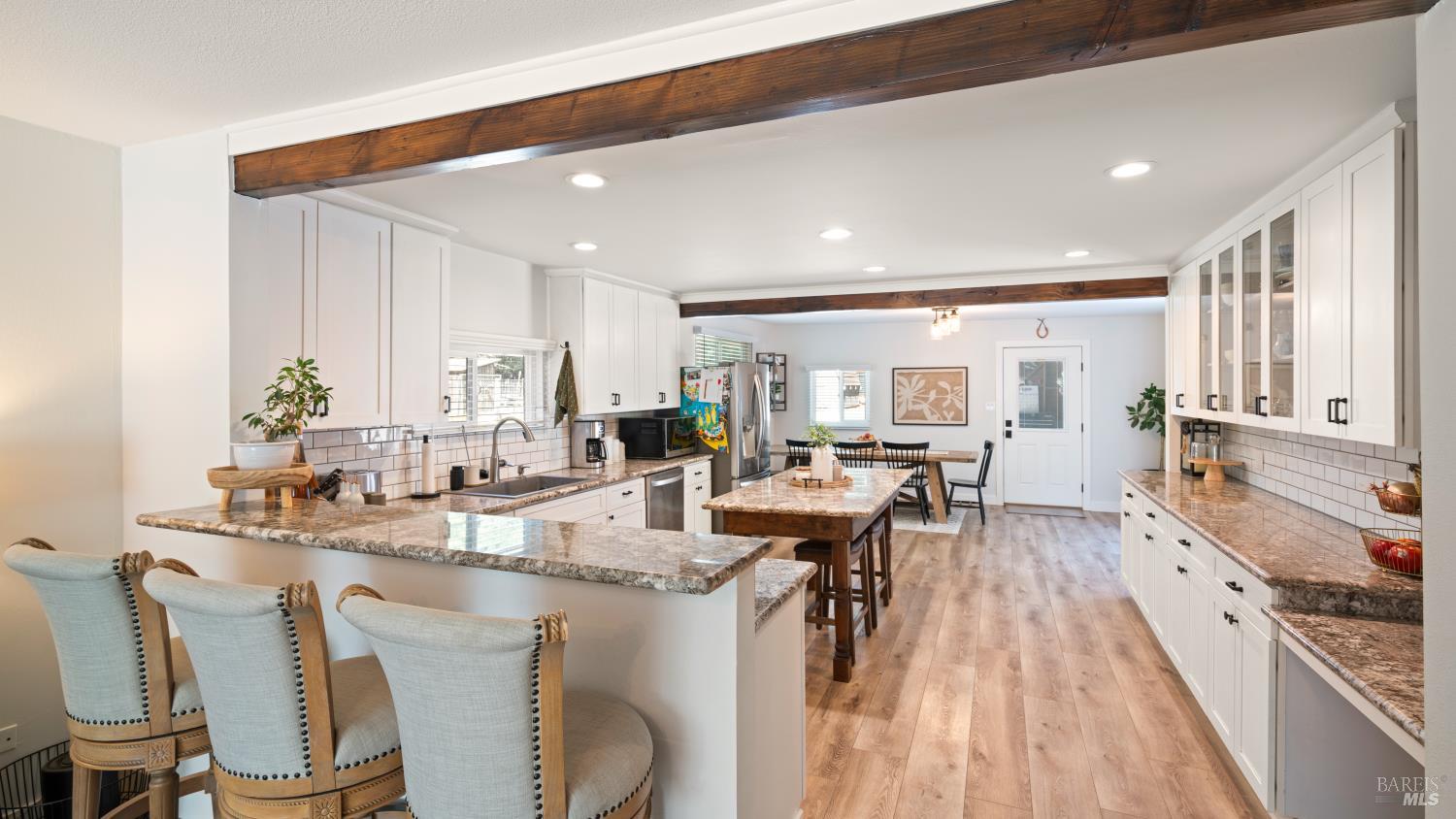 1550 Laguna Road Santa Rosa, CA 95401 - Photo 21 of 35 Bar to eat at or visit while entertaining in the open and updated kitchen/dinig room