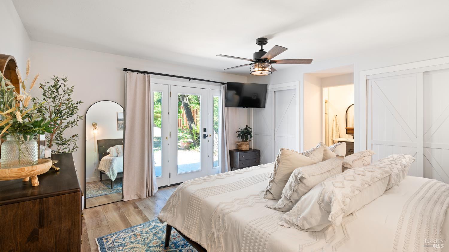 1550 Laguna Road Santa Rosa, CA 95401 - Photo 29 of 35 Primary suite with luxury vinyl floorng, new paint and primary bathroom