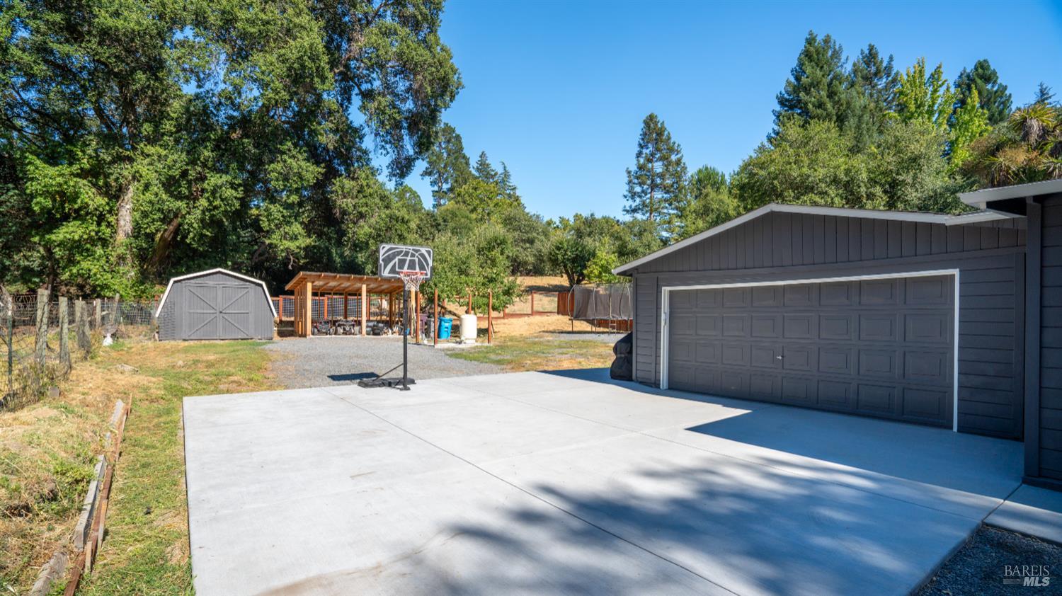 1550 Laguna Road Santa Rosa, CA 95401 - Photo 9 of 35 Concrete driveway and plenty of room for all your toys