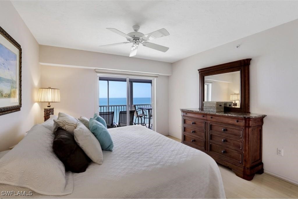 1020 South Collier Boulevard, Unit 507 Marco Island, FL 34145 - Photo 16 of 25 a bedroom with a large bed and a window