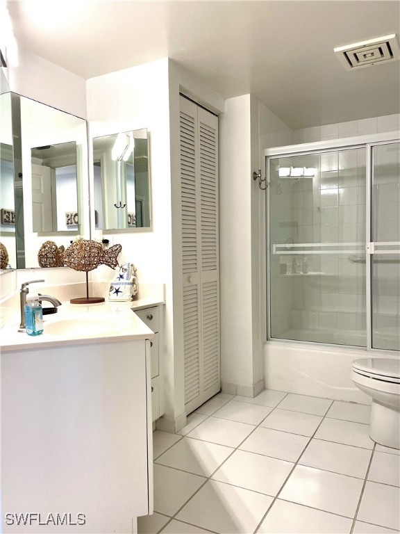 1020 South Collier Boulevard, Unit 507 Marco Island, FL 34145 - Photo 21 of 25 a bathroom with a sink a toilet and shower