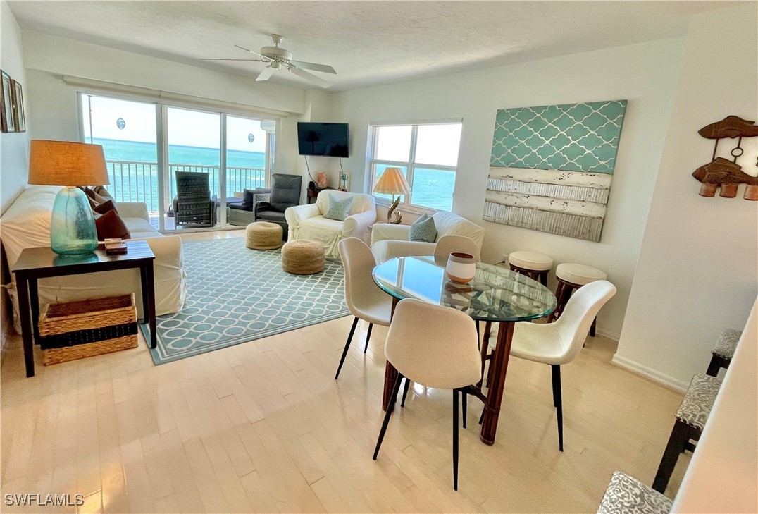 1020 South Collier Boulevard, Unit 507 Marco Island, FL 34145 - Photo 10 of 25 a living room with furniture and a window