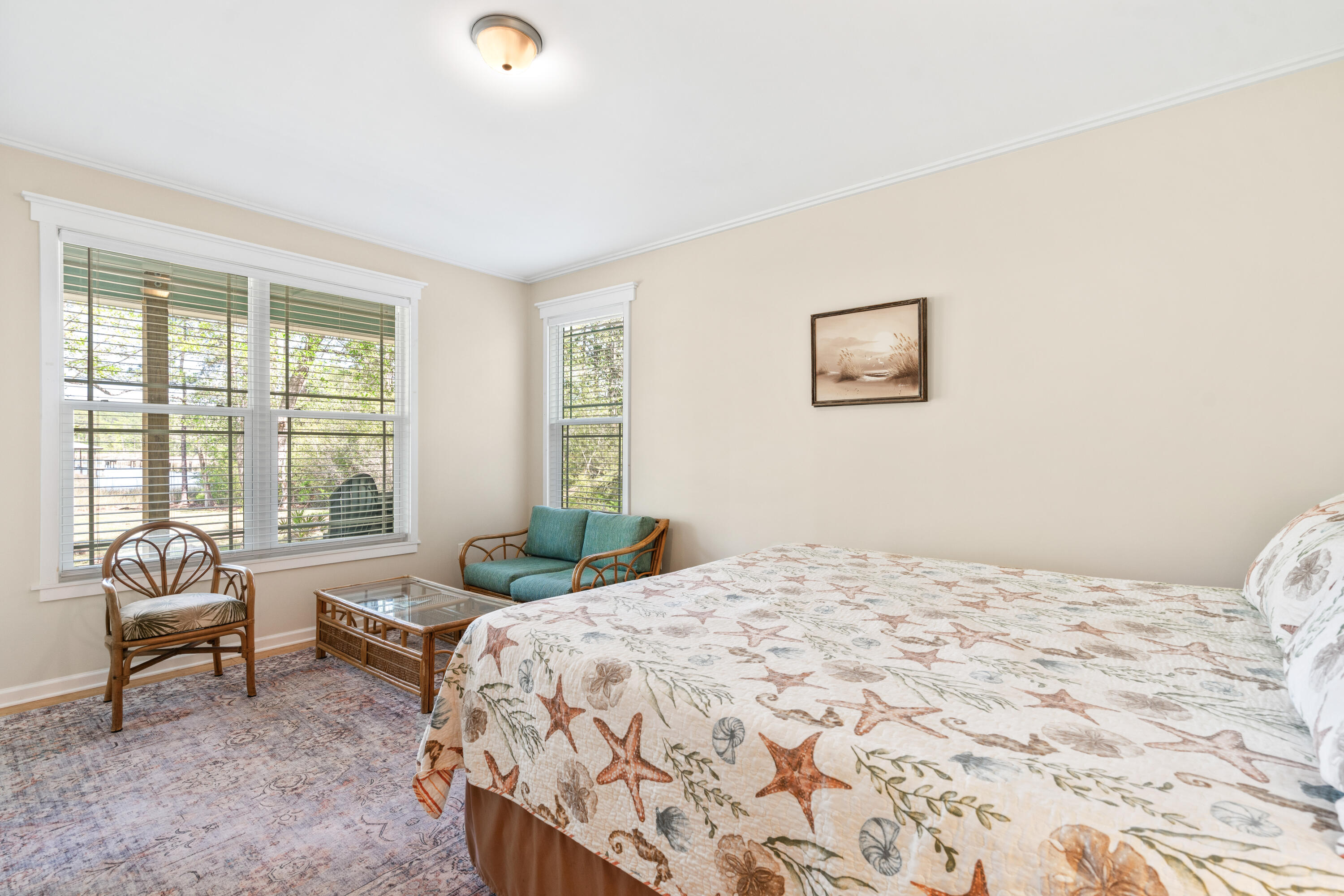 528 Bay Grove Road Freeport, FL 32439 - Photo 14 of 68 a bedroom with a bed and large windows