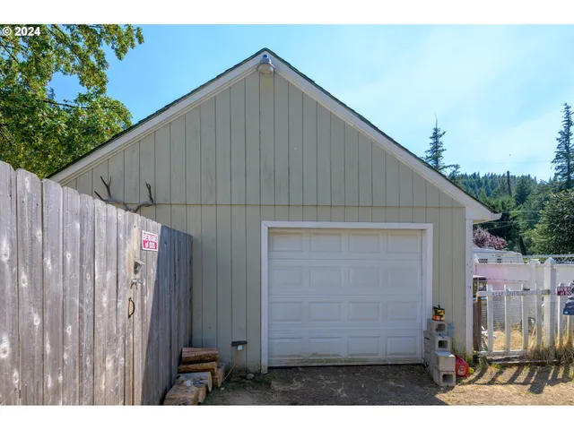a house view with a backyard space