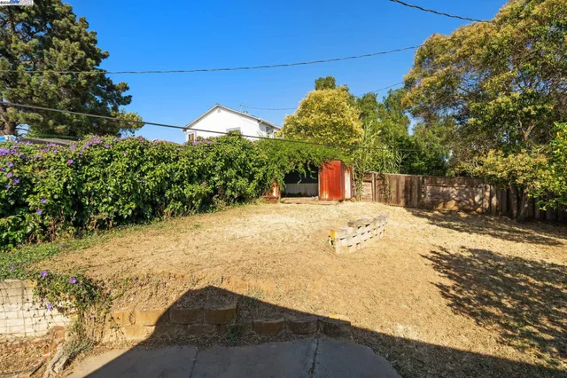 a view of a house with a flat screen tv and potted plant