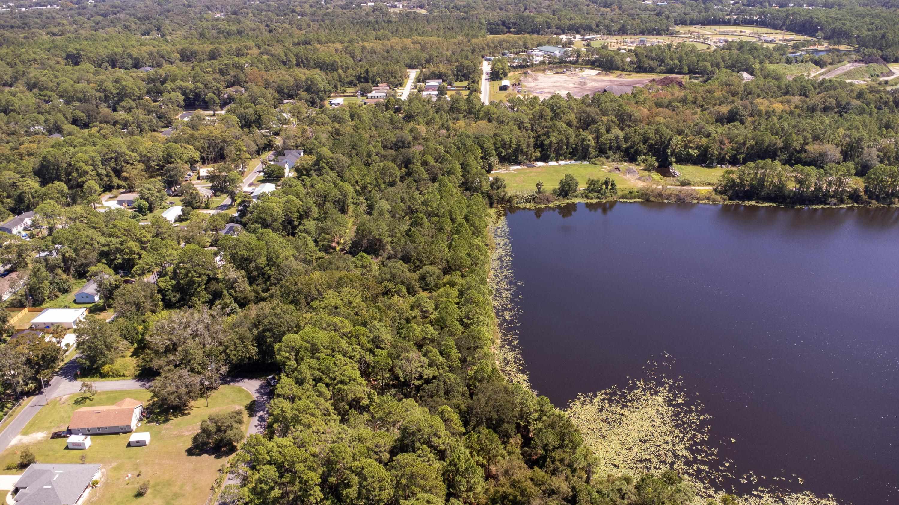 West 15th Street St. Augustine, FL 32084 - Photo 11 of 14 a view of a lake with a city