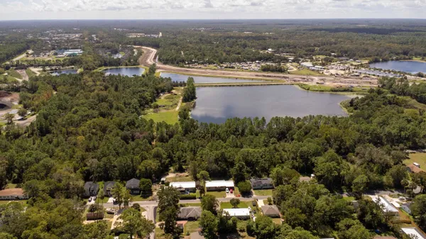 a view of a city with mountains in the background