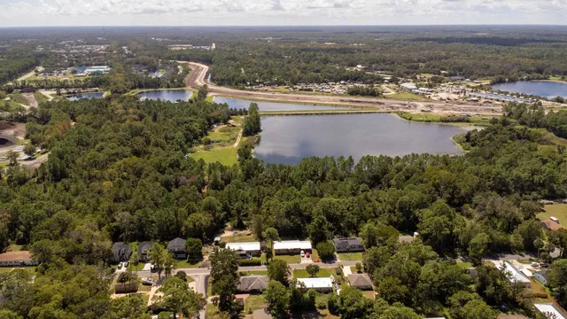 a view of a city with mountains in the background