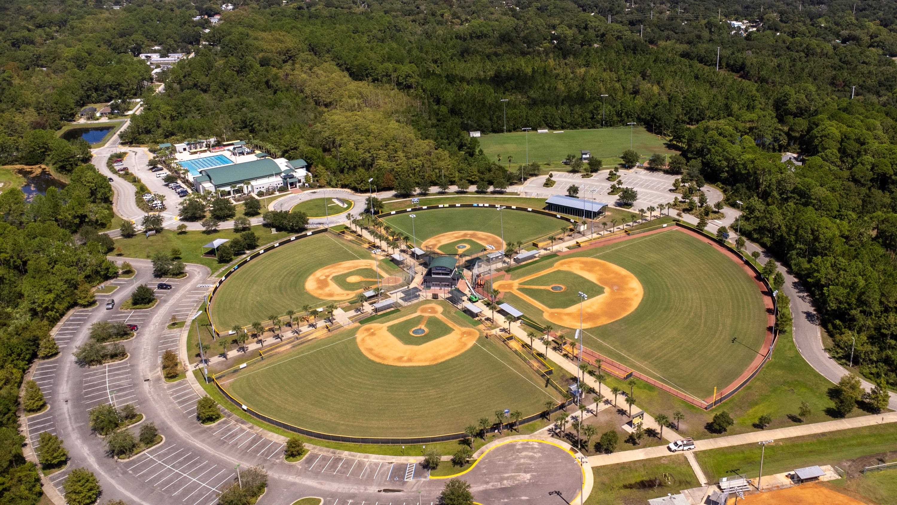West 15th Street St. Augustine, FL 32084 - Photo 5 of 14 an aerial view of a swimming pool with outdoor seating