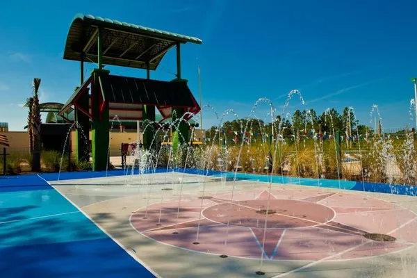 a view of a city with mountains in the background