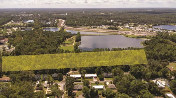 a view of a lake with a city