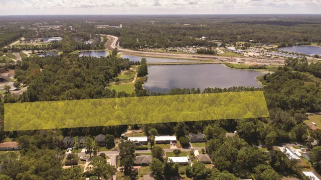 a view of a lake with a city