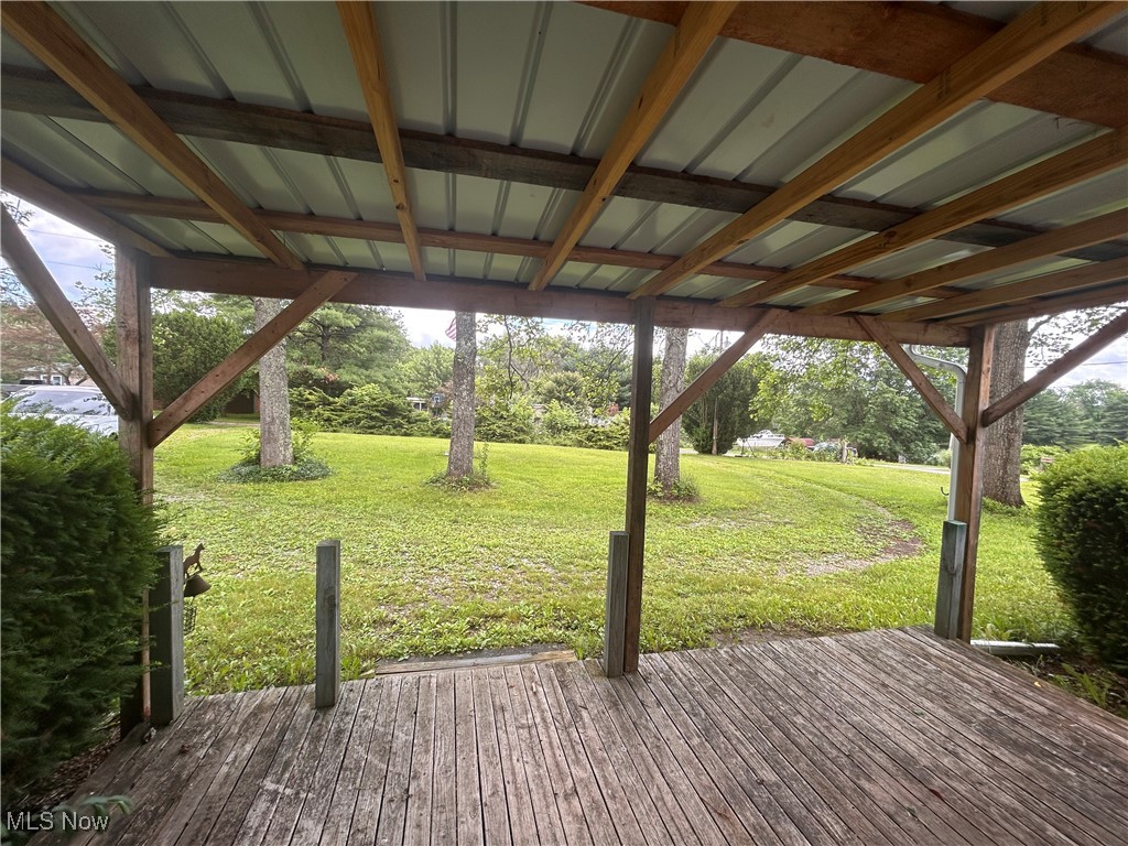 78790 Hamilton Ridge Road Freeport, OH 43973 - Photo 2 of 17 Wooden deck featuring a yard