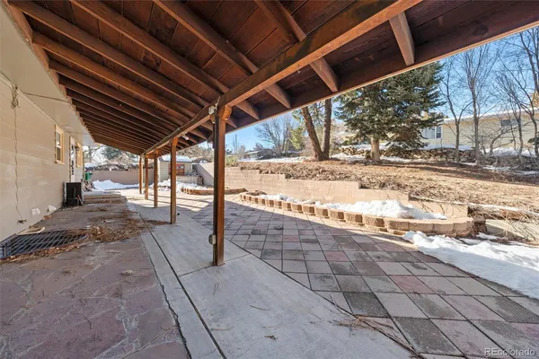 a view of a backyard of the house